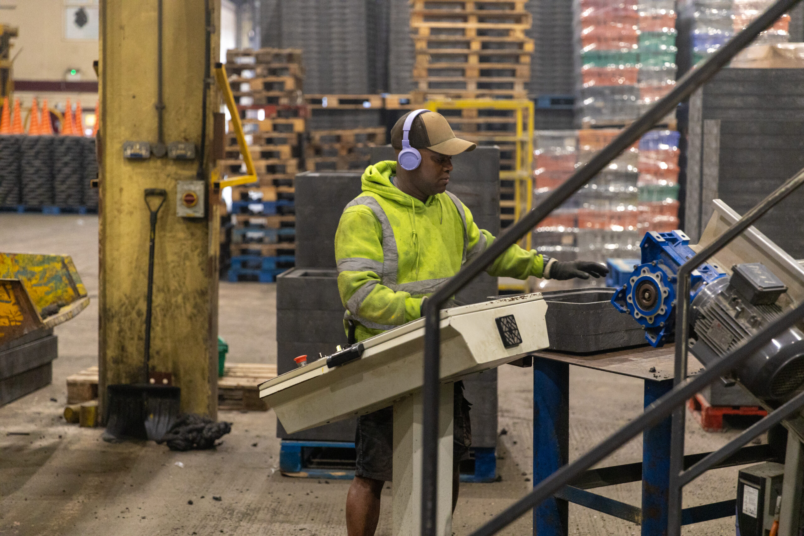 Injection moulding machine operator operating a PRESNA machine at Heyside Group