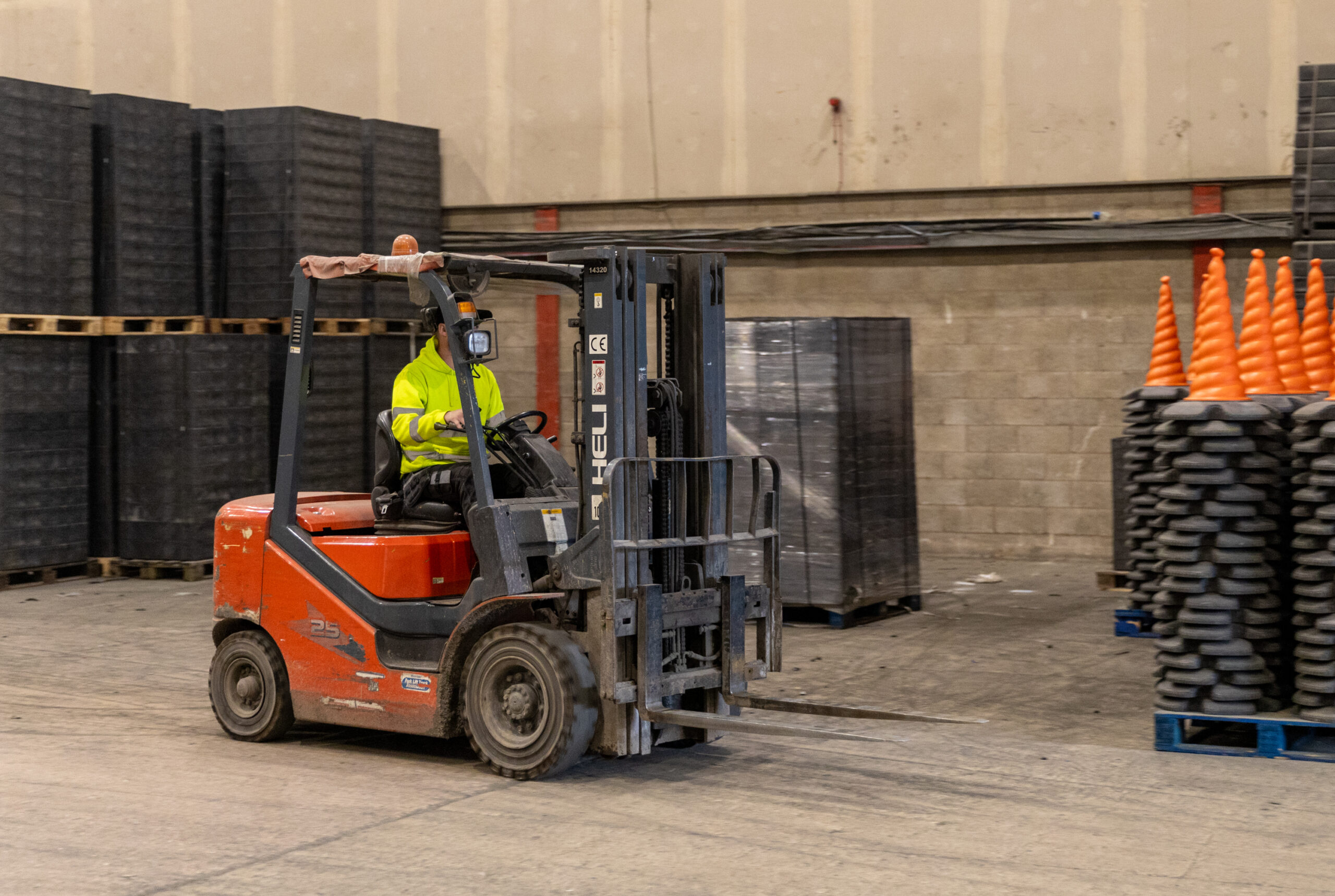 Man driving forklift truck