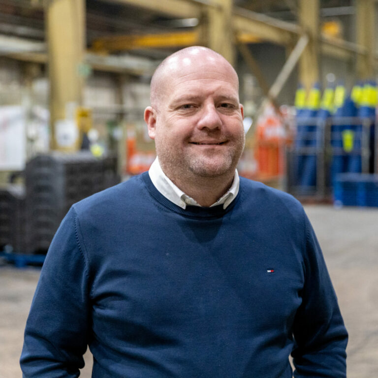 Matt Pryce, Managing Director of Heyside Group, stands in the firm's Oldham injection moulding factory