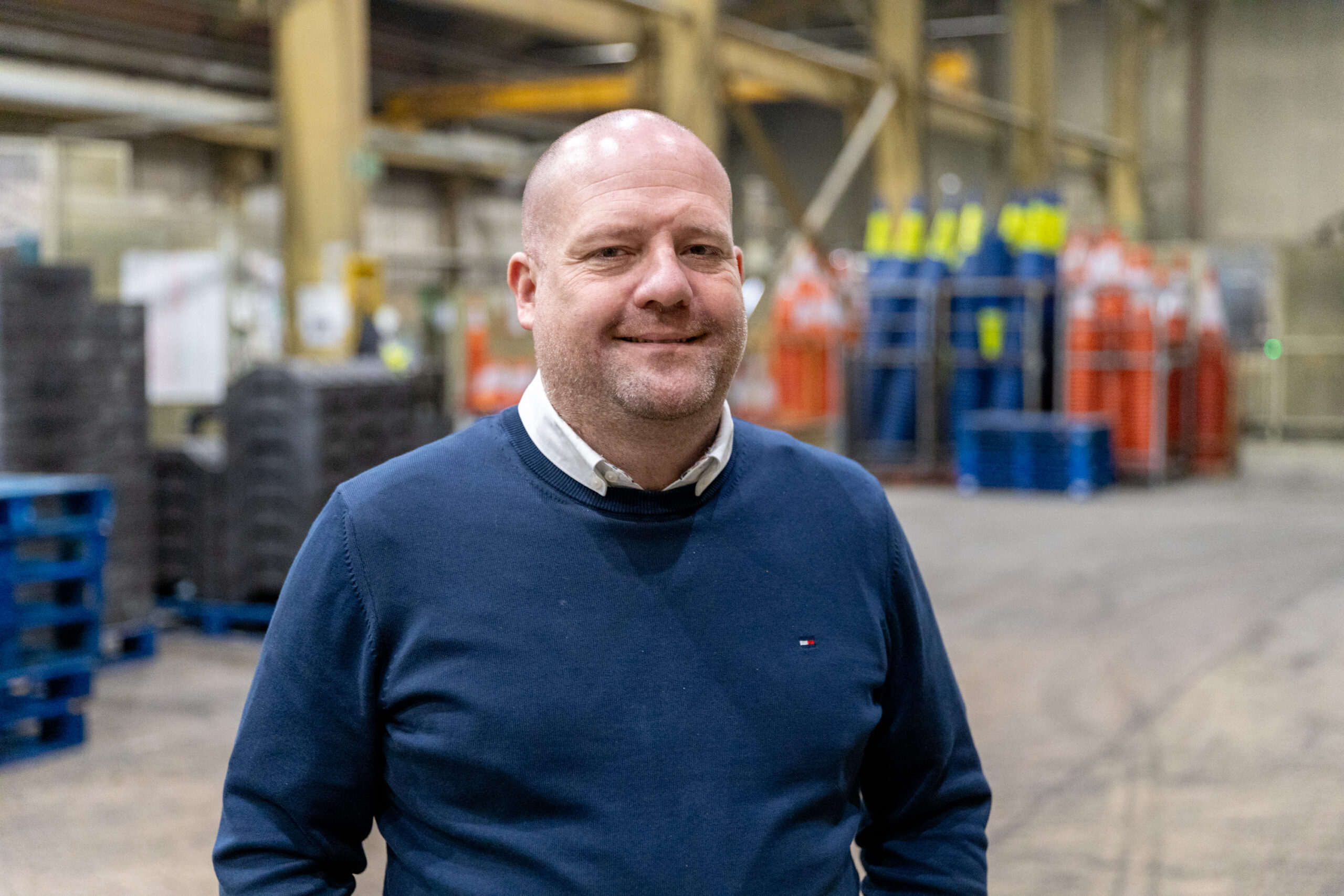 Matt Pryce, Managing Director of Heyside Group, stands in the firm's Oldham injection moulding factory