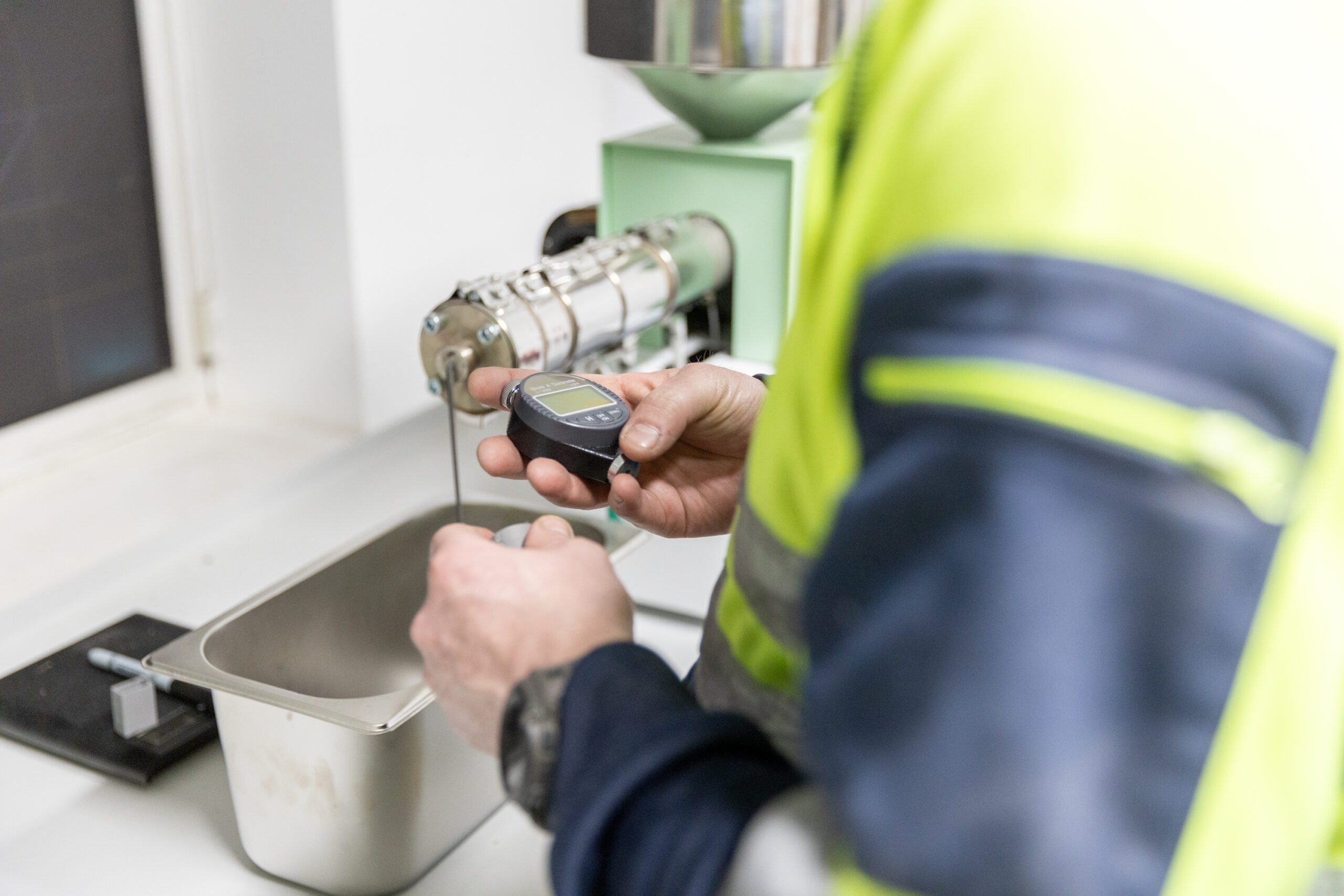 Heyside Group operative uses machinery in injection moulding project