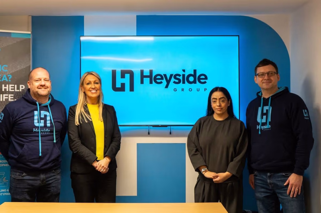 Matt Pryce and Garreth Brown of Heyside Group with representatives of Oldham Council and the GM Business Growth Hub