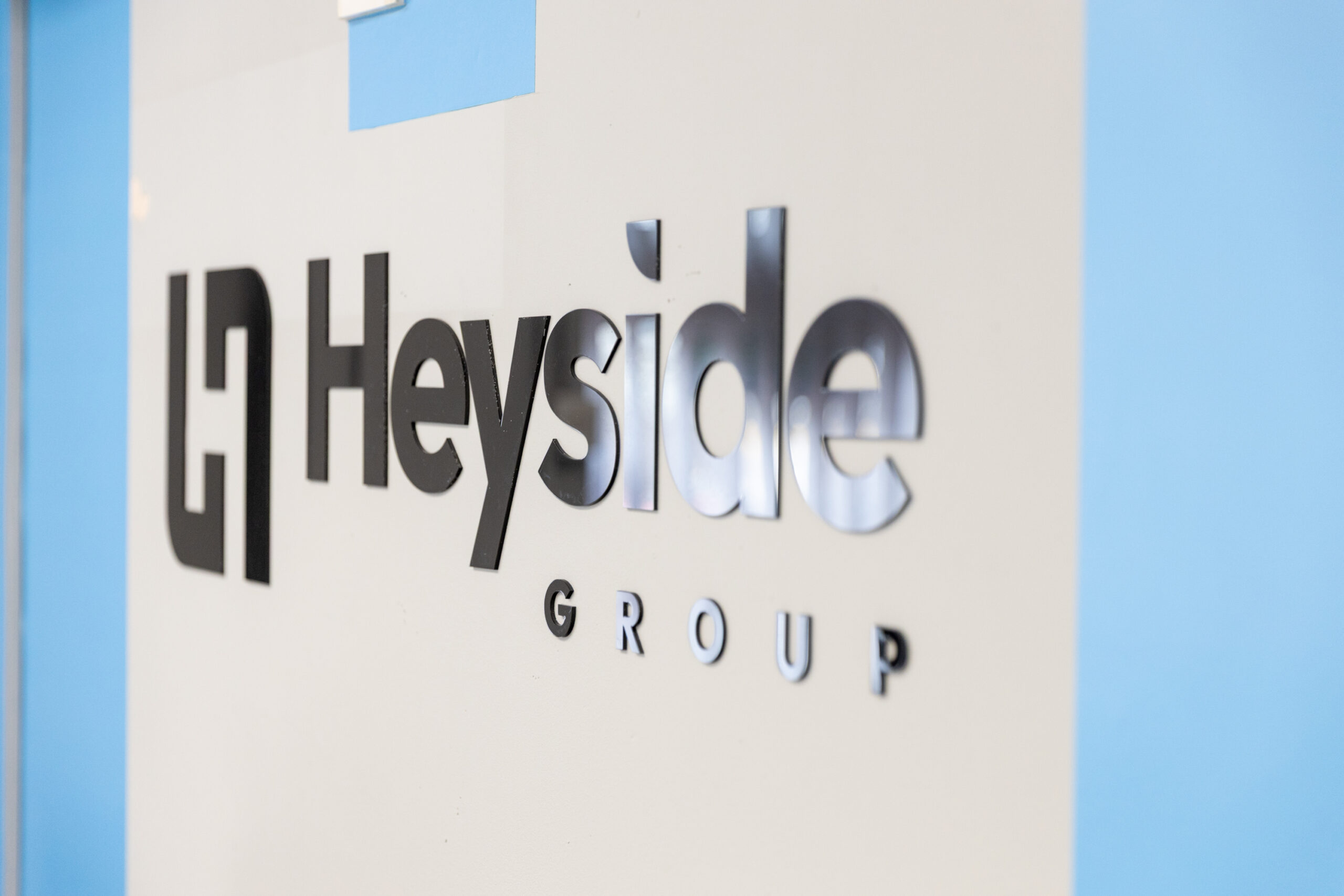 Heyside Group signage on wall